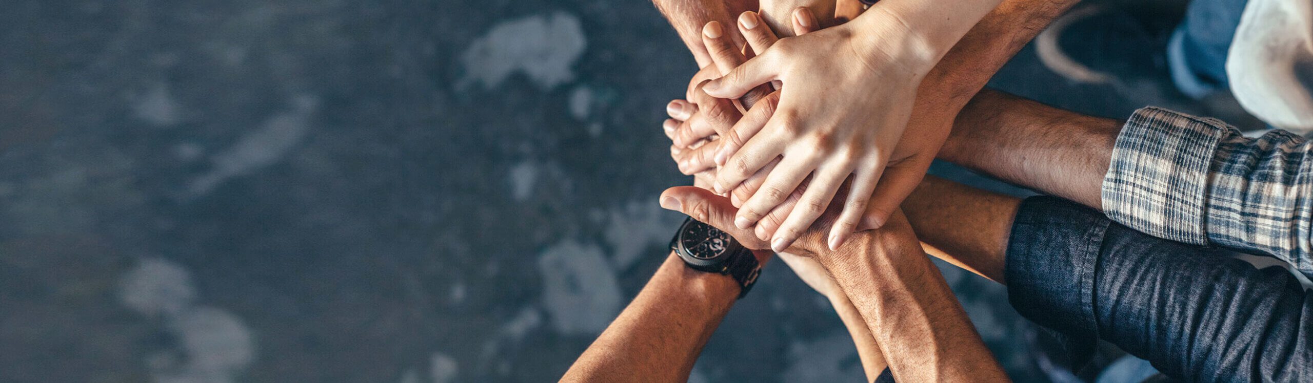 hands in a circle teamwork