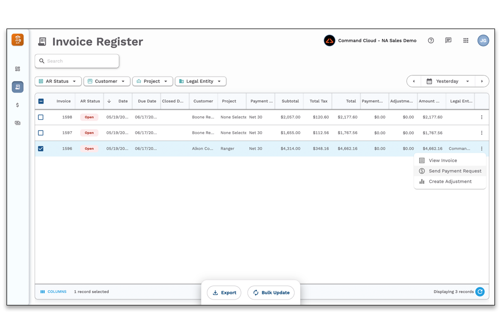man sitting at desktop computer using apex