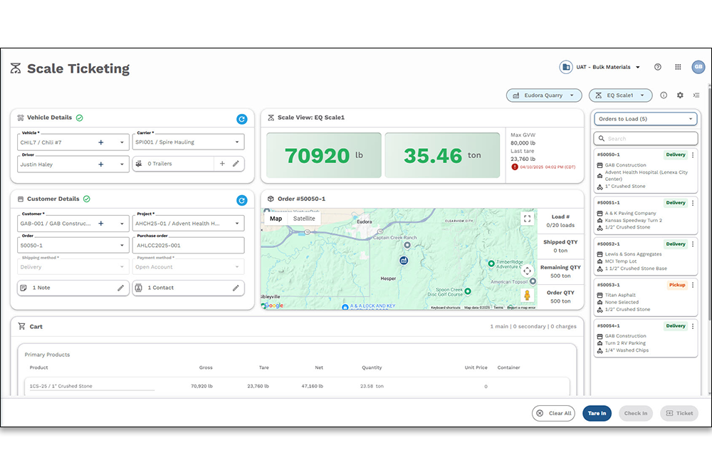 man sitting at desktop computer using apex